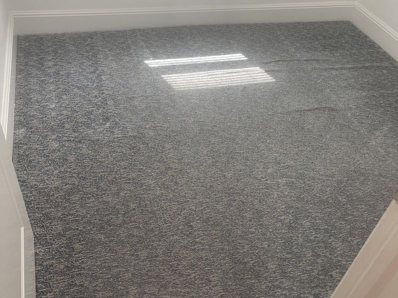 The same bedroom carpet after deep cleaning by Dr Carpet