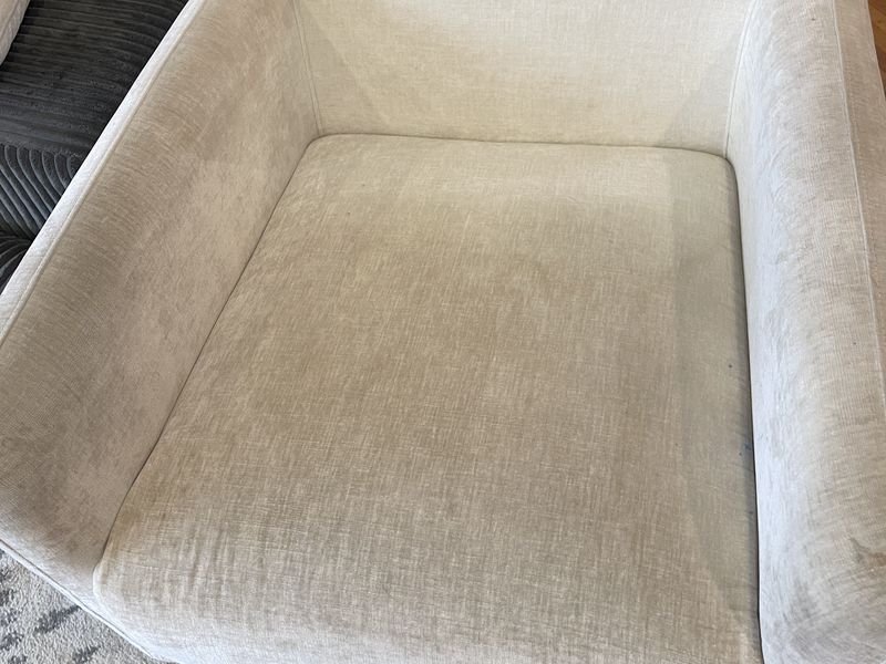 Cream armchair before upholstery cleaning by Dr Carpet
